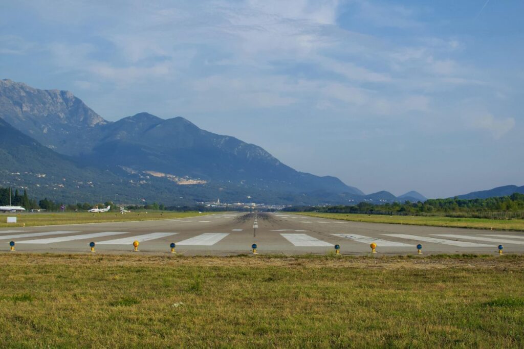 Tivat Airport aerial view in Montenegro near the Bay of Kotor coastline